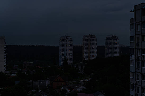 istock Gloomy Cityscape at Dusk with Distant Towers 2219793625