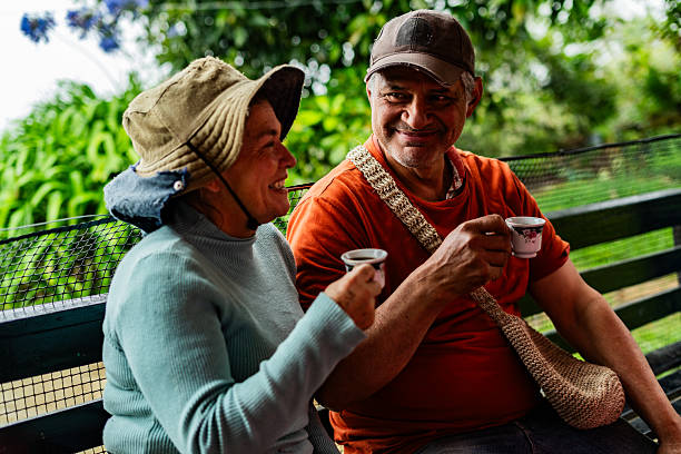 istock Couple drinking coffee on a farm 2219794980