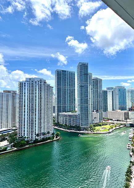 istock Speedboat navigating the Miami River surrounded by Brickell's skyscrapers in Florida 2219805372