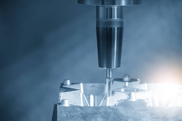 istock The CNC milling machine finish cut the mold parts by solid ball nose end mill tool in the light blue scene. 2219806033