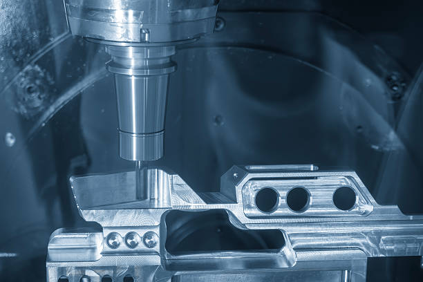 istock The 5-axis CNC milling machine cutting the aerospace part with solid ball end mill tool in the light blue scene. 2219806039