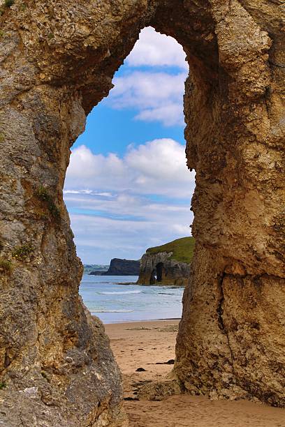 istock Whiterocks Beach arch in Northern Ireland 2219809216