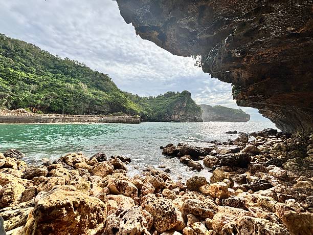 istock Rocky Shoreline and Cliffside View by the Sea 2219809462