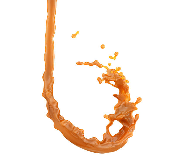 istock 3D render of caramel splash isolated on white background 2219809530
