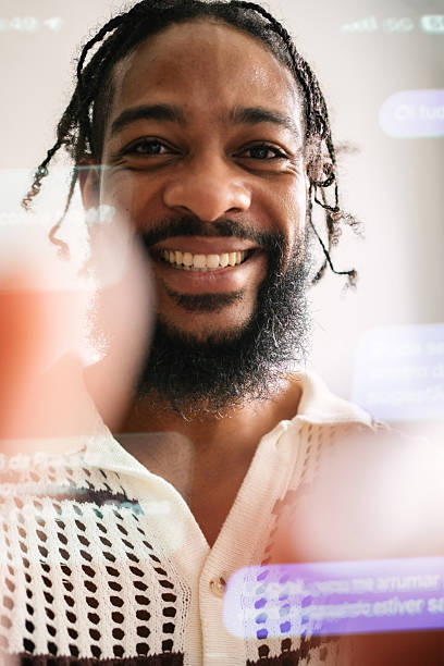 istock Young man in personal perspective text messaging in Portuguese 2219809745