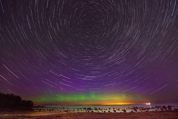 istock Star Trails Night Sky Cosmos Galaxy Time-lapse 2219810893