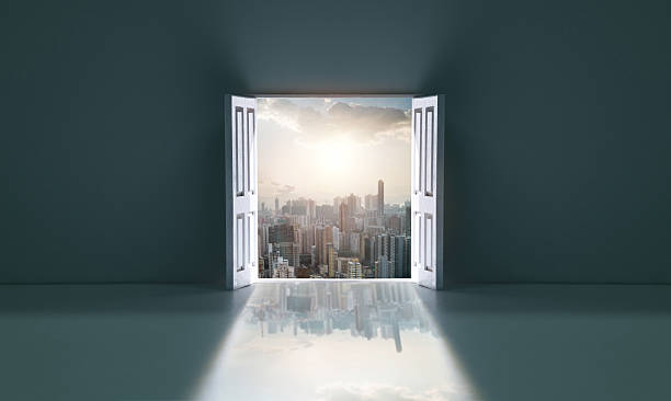 istock Open door with modern cityscape 2219813941