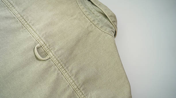 istock Back of a Khaki Jacket with Stitched Loop Detail 2219822516
