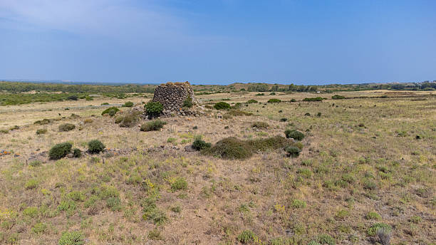 istock Nuraghe Tradori  Ancient Stone Tower in Narbolia, Sardinia 2219825367