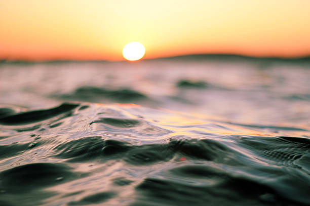 istock Soft Rippled Sunset Waves on Silver Lake 2219829929