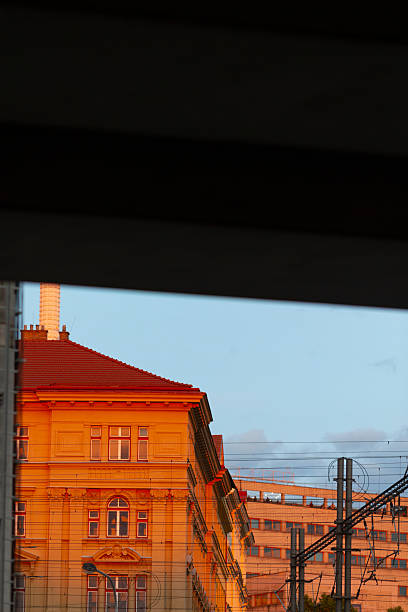 istock A Reflection of Urban Buildings and Train Tracks During Sunset Hours 2219833404