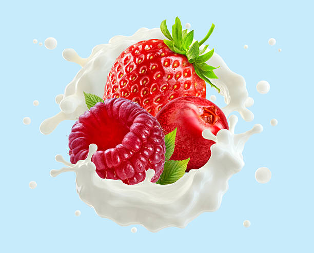 istock Fresh berries - strawberry, raspberry, cranberry, with milk or yogurt splash isolated on blue background 2219836251