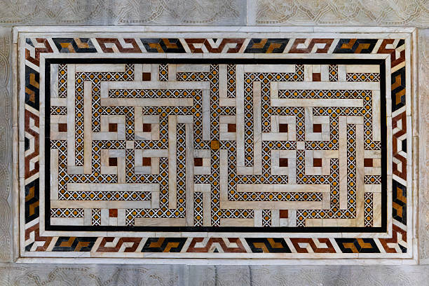 Intricate Geometric Marble Mosaic wall in the Qalawun Complex.