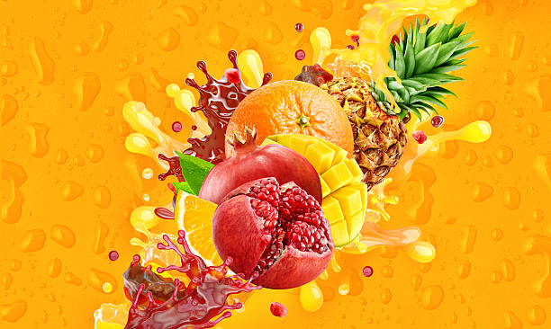 istock Mixed fruits — pomegranate, orange, pineapple, mango — with dynamic juice splashes on vibrant background 2219840438