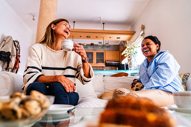 istock Friends talking during afternoon tea at home 2219841198