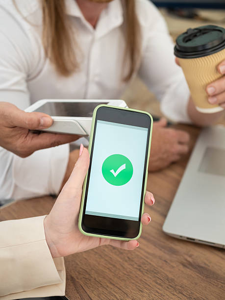 istock Mobile payment transaction in business meeting 2219844811