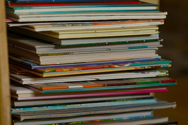 A wellorganized collection of diverse magazines, neatly stacked and showcasing vibrant colors and innovative designs that captivate and spark interest with their unique content