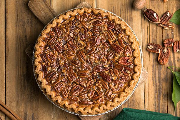 istock Fall traditional pies  pecan crumble pie overhead shot 2219851723