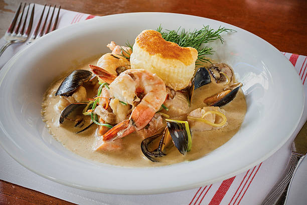 pan roasted shrimp, mussels, scallops and calamari served in creamy tomato broth