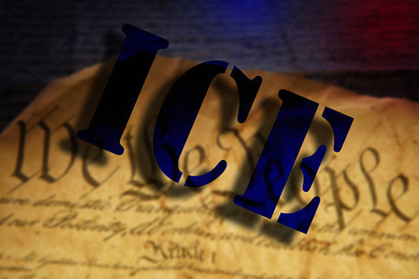 istock ICE - Immigration and Customs Enforcement - text over We The People text on the US Constitution 2219853878