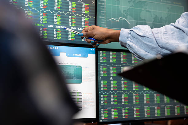 istock Entrepreneur reviewing forex market 2219856878