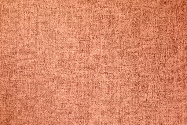 Old torn wallpaper on the wall.Old wallpaper for texture or background.