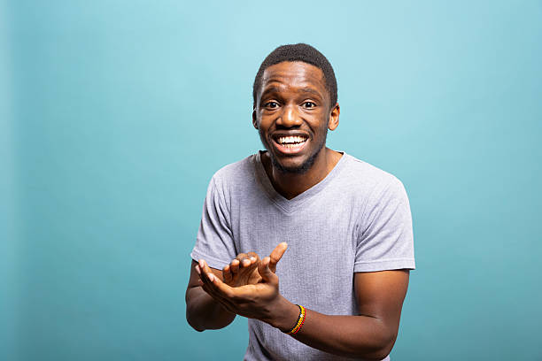 istock African american man clapping his hands 2219863723