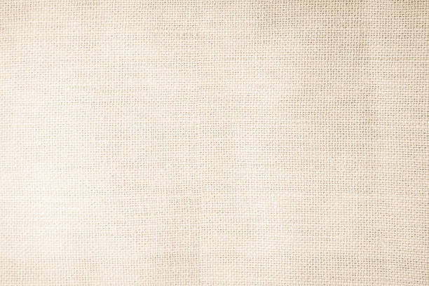 istock Brown sackcloth woven texture background in natural pattern. Jute hessian burlap, linen background in light beige cream color blank. Weaving canvas fiber line cotton cloth textured as organic. 2219866090