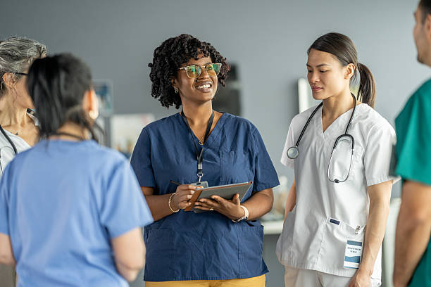 istock Medical Team Engaged in Collaborative Discussion in a Hospital Setting 2219866265