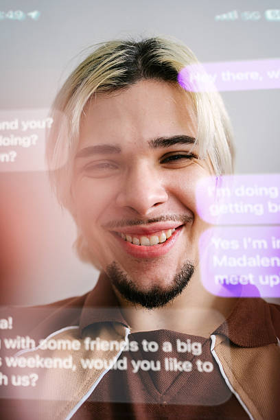 istock Young man in personal perspective text messaging in English 2219868831