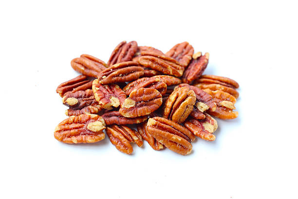 istock Delicious salted pecan nuts scattered. 2219869968