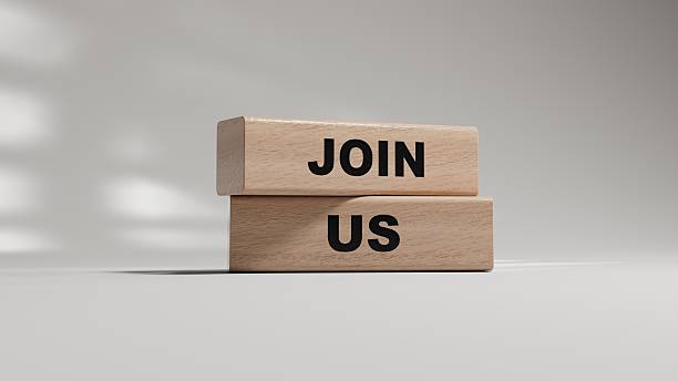 istock Join us word on wooden blocks on wood table. Copy space.3D rendering on white background. 2219875034
