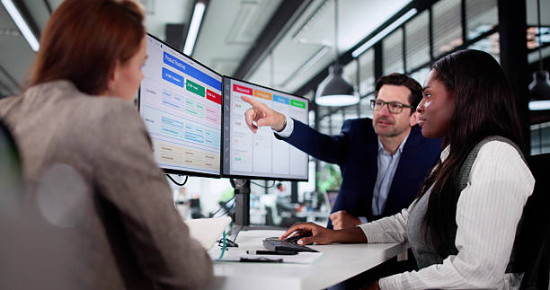 istock Multiracial Manager Uses Kanban Software On Laptop 2219887778