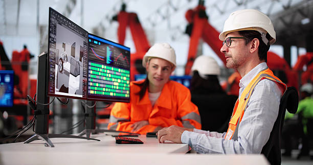 istock Engineers Are Using Technology To Design An Electric Car At The Factory 2219887833
