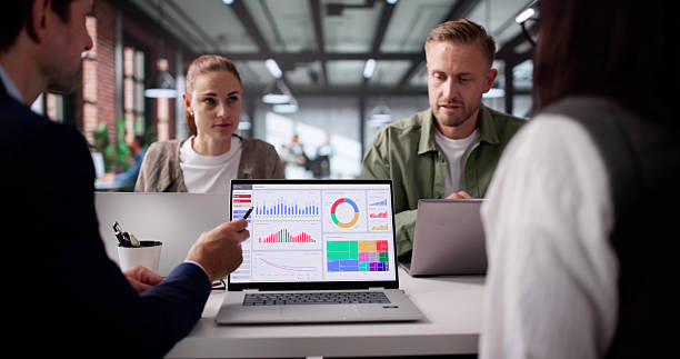 istock Young African Data Analyst Leads Business Meeting 2219887865
