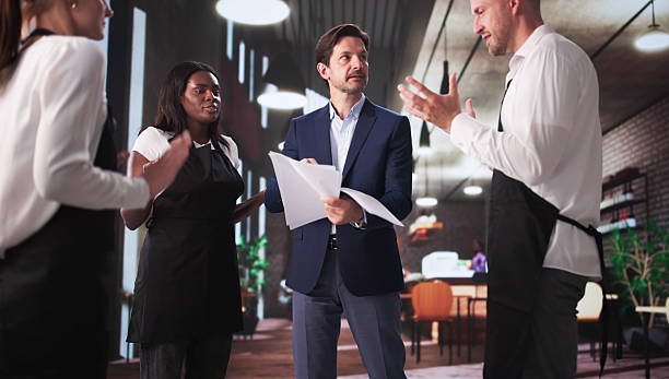 istock Restaurant Boss Argues With Diverse Team 2219888509