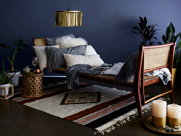 istock Cozy Boho Lounge with Rattan Daybed and Candles 2219889216