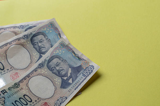 istock Japanese 1,000 yen bills on display 2219891226