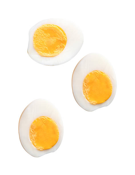 istock Top view set of cooked or boiled chicken eggs with egg yolk in three halves isolated on white background with clipping path 2219895552