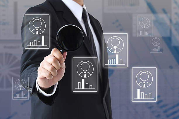 istock Image of analyzing various human resource characteristics with a magnifying glass 2219895808
