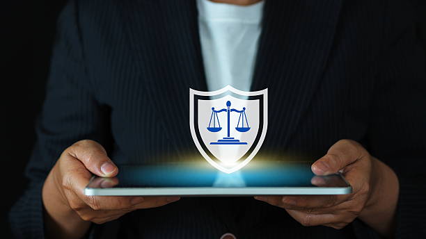 istock law and technology integration showing shield, justice balance, digital security, and privacy rights defense online. 2219902012