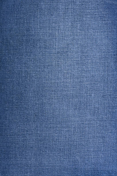 istock Blue denim jeans texture close up. Blue denim jeans background. 2219904877