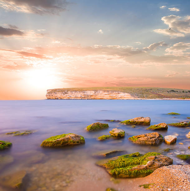 calm sea bay at the dramatic sunset