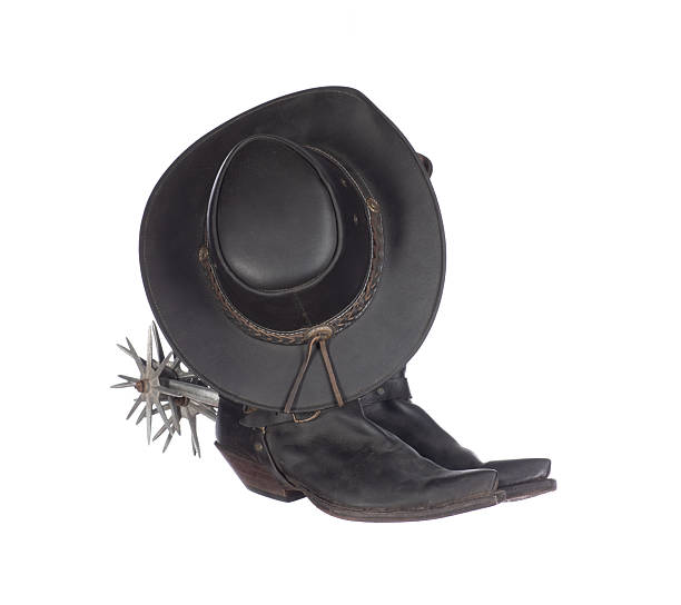 istock cowboy boots with spurs, cowboy hat isolated on white background 2219910549