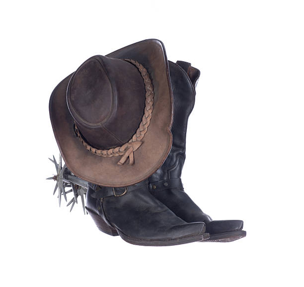 istock cowboy boots with spurs, cowboy hat isolated on white background 2219910634