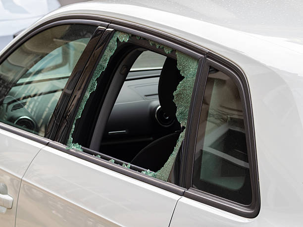 istock Broken Car Window with Shattered Glass 2219911898