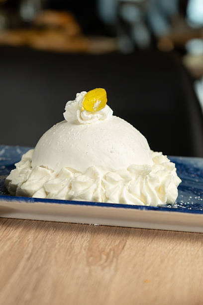 istock Sweet lemon delight with cream at a restaurant table 2219915162