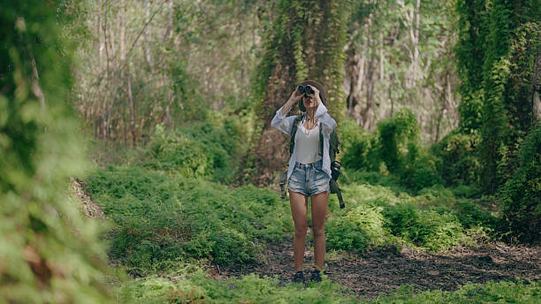istock Young women trekking in the forest 2219915780