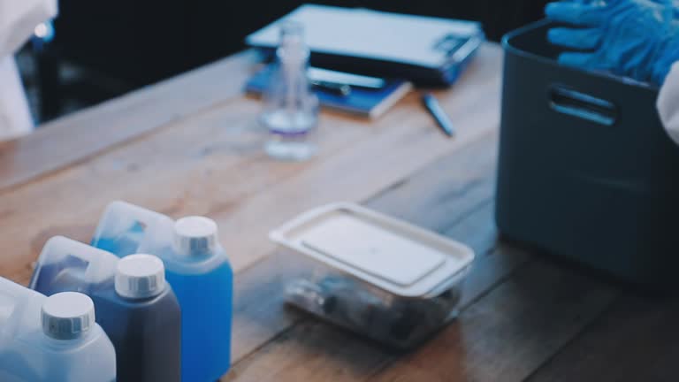 Scientist analyze biochemical samples in advanced scientific laboratory. Medical professional use microscope look microbiological developmental of viral. Biotechnology research in science lab.