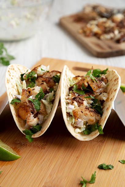 istock Homemade Fresh Fish Tacos, side view. 2219930166
